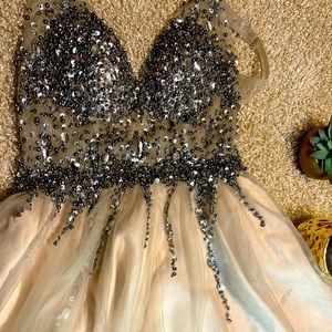 Beaded prom dress size 11 fits like a medium.